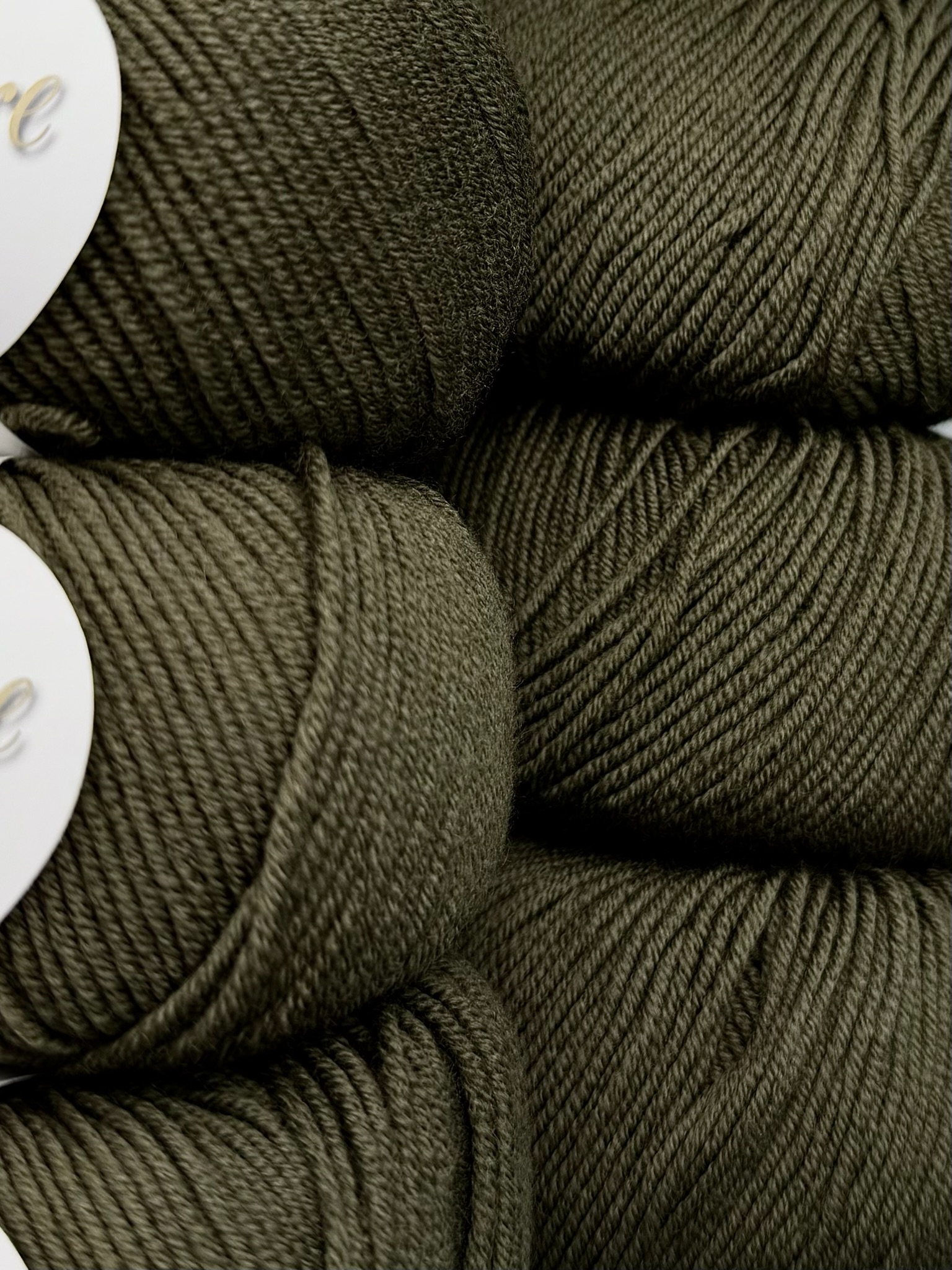 Art. Migliore (10 gomitoli) – 100% lana merino extrafine col. Verde oliva scuro foto 2