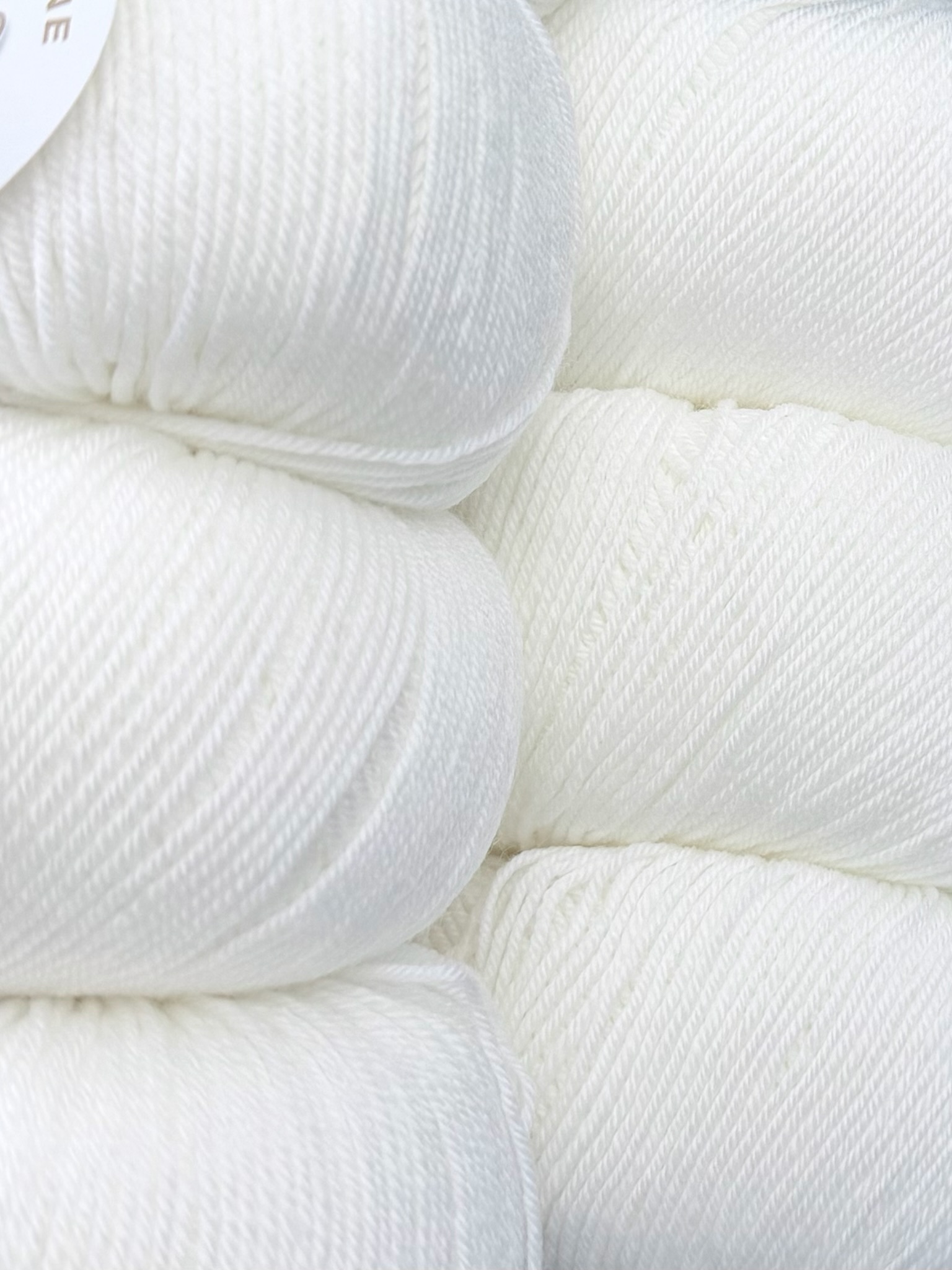 Art. Prezioso (10 gomitoli) – 100% lana merino extrafine superwash col. Bianco 115 foto 2