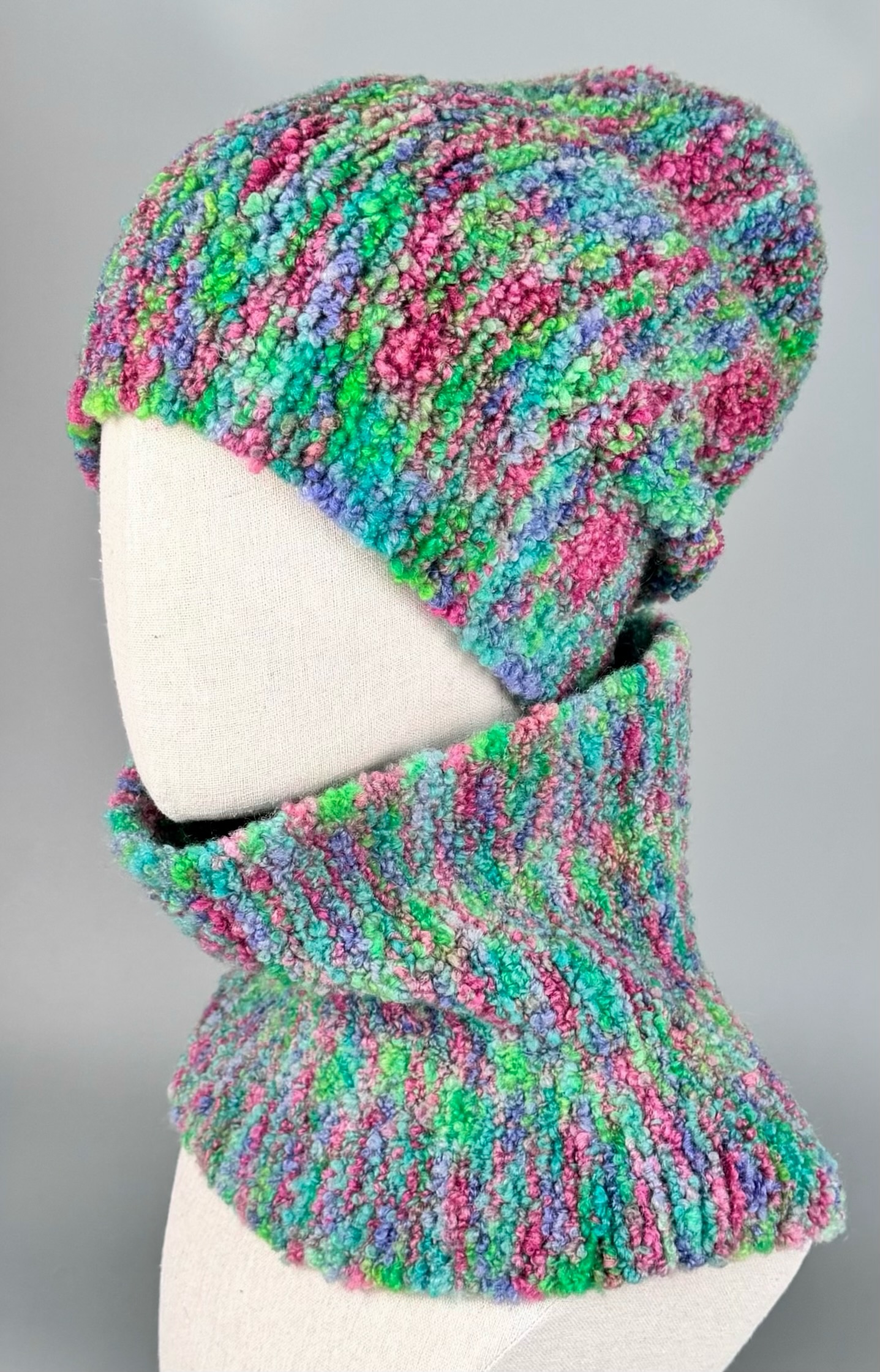 Corallo Bouclé 240m/100g – Merino Extrafine und Seide mit Elastan Mint-Rosa Melange foto 3