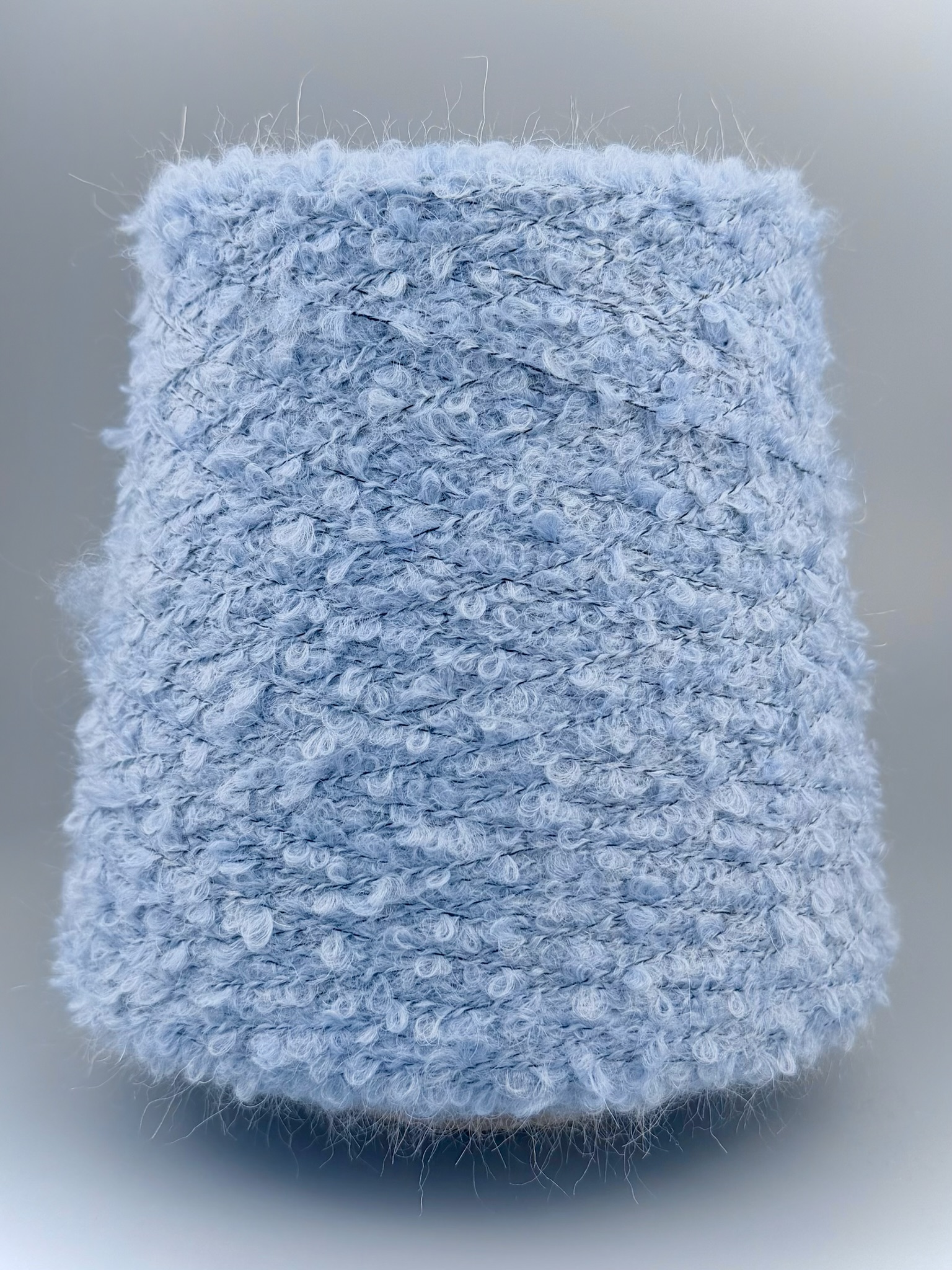 Lagopolane Bouclé 420m/100g – Garn aus Mohair und Merino mit Elastan Himmelblau foto 2