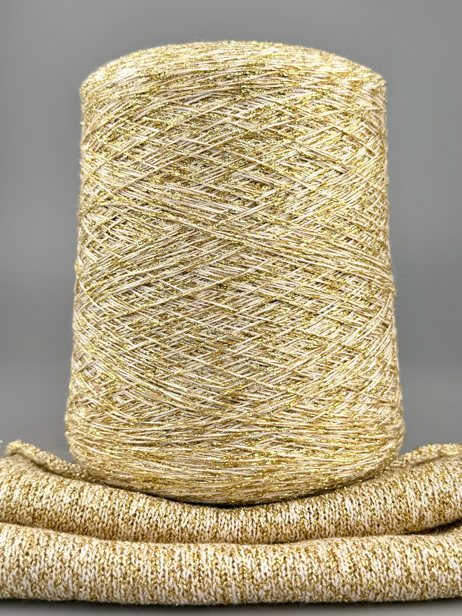 Lurex Viskose mit Elasthan 1270m/100 g – Outlet – Glanzgarn Gold foto 2