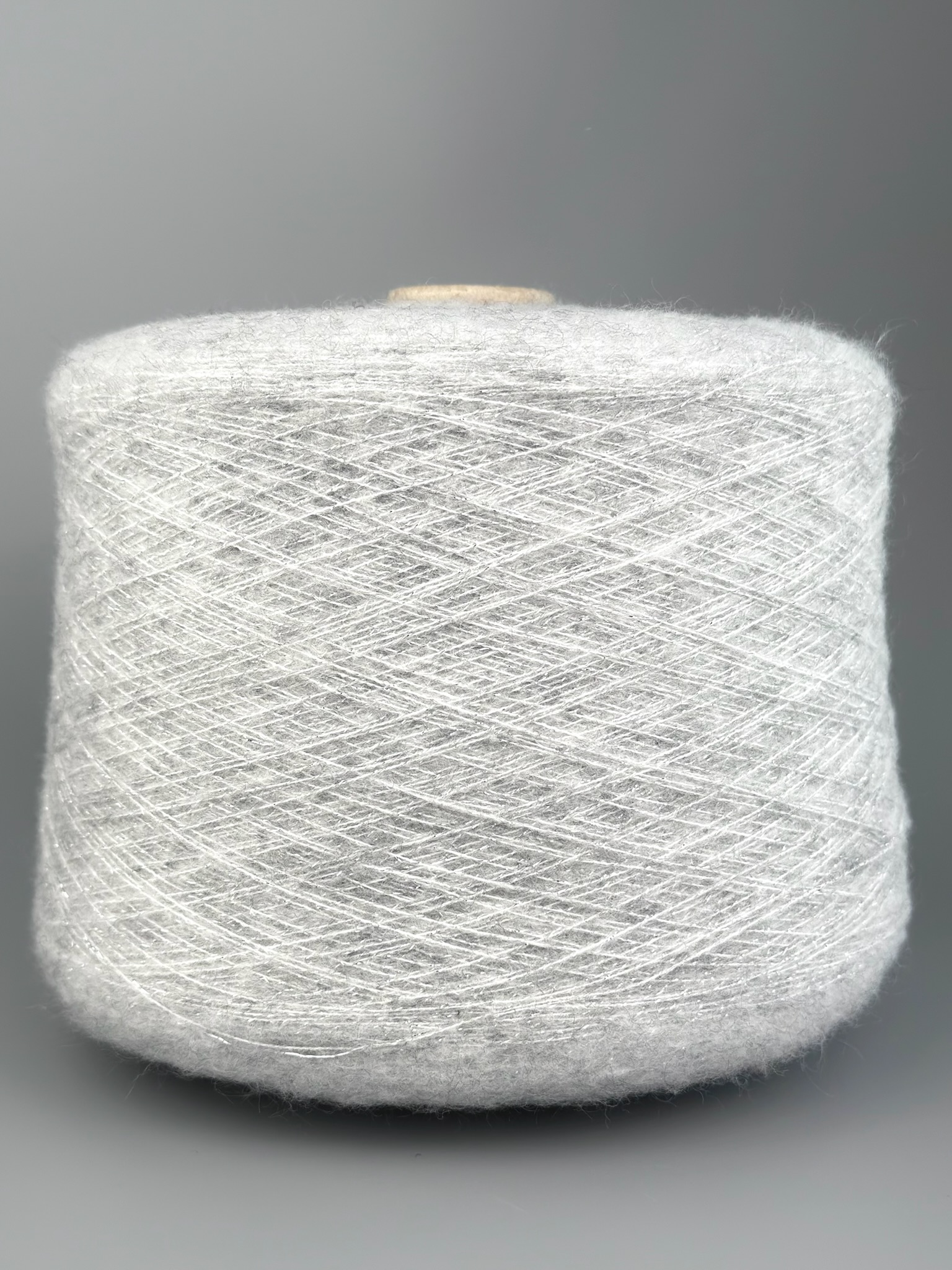 Art. Therhythmofthenigh – Filato con Lurex e Lana col. Grigio Perla Argento Mélange 1070 m / 100 g foto 2