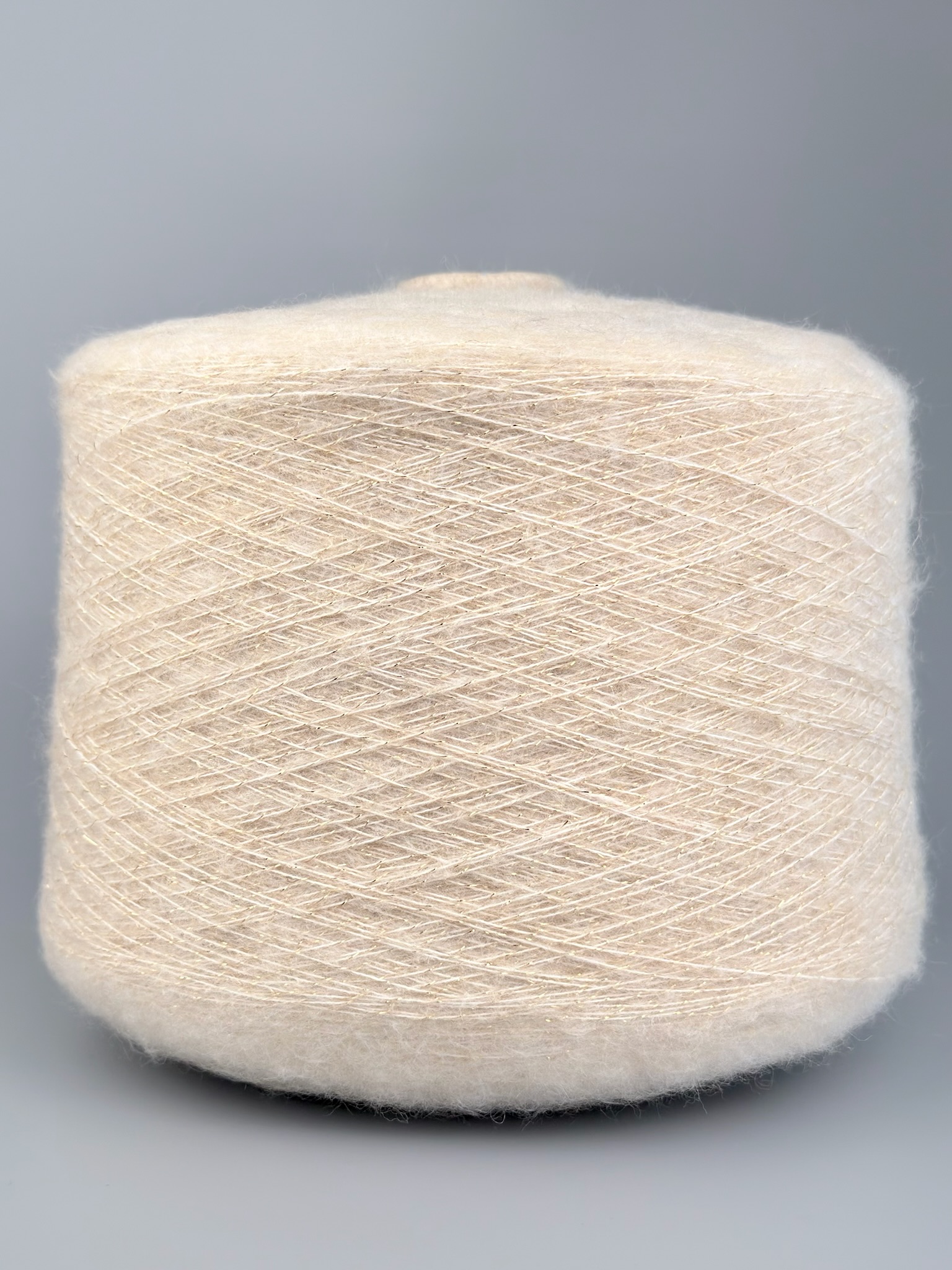 Art. Therhythmofthenigh – Garn mit Lurex und Wolle col. Hellbeige 1070 m / 100 g foto 2